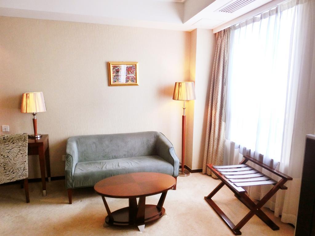 Ramada Shanghai Wujiaochang Habitación foto