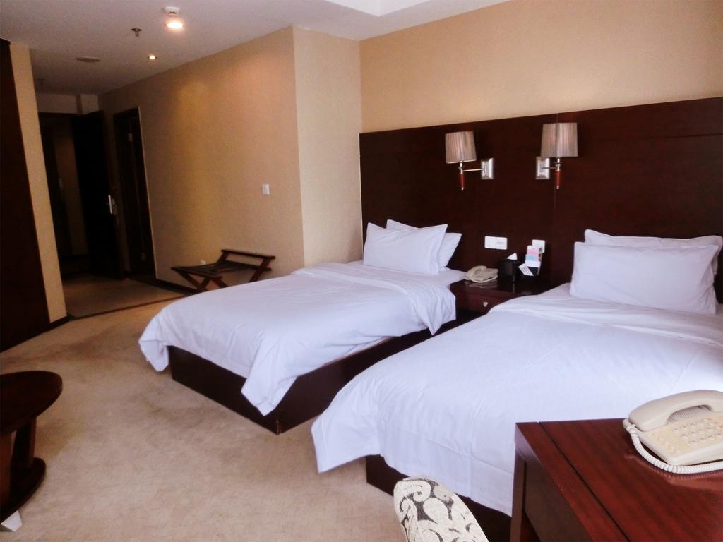 Ramada Shanghai Wujiaochang Habitación foto