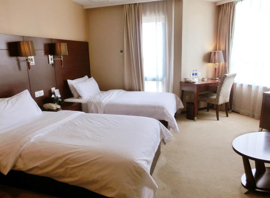 Ramada Shanghai Wujiaochang Habitación foto