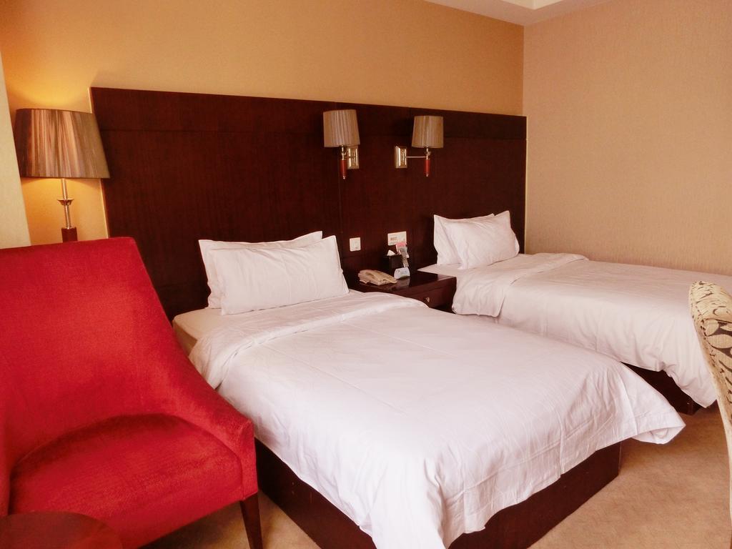 Ramada Shanghai Wujiaochang Habitación foto